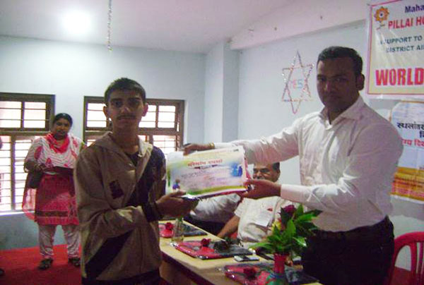 The Champion Sanjay Sharma receiving the certificate from the Guest